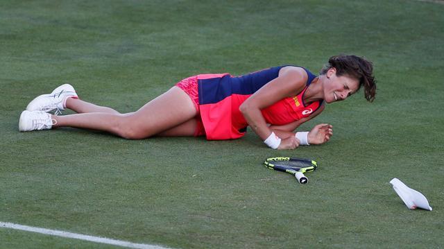 Johanna Konta goes down injured during her quarter finals match against Germany's Angelique Kerber. (Action Images via Reuters) Johanna Konta goes down injured during her quarter finals match against Germany's Angelique Kerber. (Action Images via Reuters)