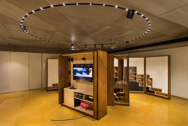 At the Shah home, walls fold out to form partitions and create intimate temporary rooms. The furniture is custom-made too. (Kunal Bhatia ) At the Shah home, walls fold out to form partitions and create intimate temporary rooms. The furniture is custom-made too. (Kunal Bhatia )