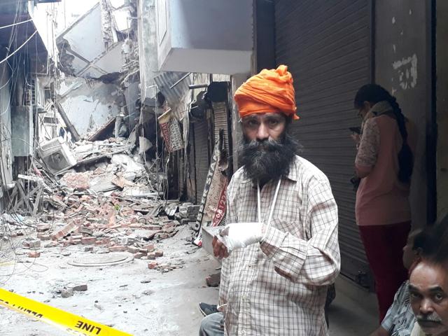 A resident of the ill-fated building, Balkar singh, sustained minor injuries. (Sushil/HT Photo ) A resident of the ill-fated building, Balkar singh, sustained minor injuries. (Sushil/HT Photo )