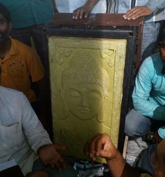 The 125kg bar of soap with the image of Buddha carved on it. (HT Photo) The 125kg bar of soap with the image of Buddha carved on it. (HT Photo)