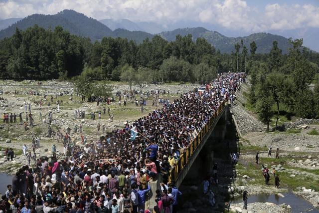 Kashmiri villagers carry the body of Bashir Lashkari. (AP) Kashmiri villagers carry the body of Bashir Lashkari. (AP)