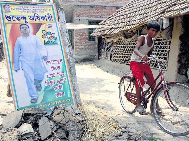 A Trinamool Congress poster in Nandigram before the 2016 Bengal Assembly polls. The court order will also come as a relief to the ruling party, who were often accused by the victim families for not doing enough to bring the culprits to book. (HT Photo) A Trinamool Congress poster in Nandigram before the 2016 Bengal Assembly polls. The court order will also come as a relief to the ruling party, who were often accused by the victim families for not doing enough to bring the culprits to book. (HT Photo)