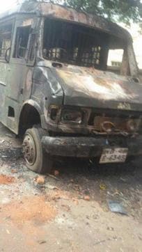 One of the police vehicles that was set on fire in front of Baduria police station by the mob on Monday night. (HT Photo) One of the police vehicles that was set on fire in front of Baduria police station by the mob on Monday night. (HT Photo)