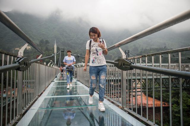 At 228 feet, this glass skywalk in China is the longest on this planet ...