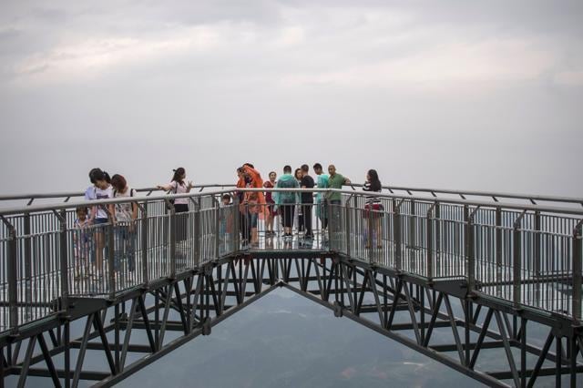 No more than 30 people are allowed on the skywalk at any one time. (AFP/Fred Dufour)