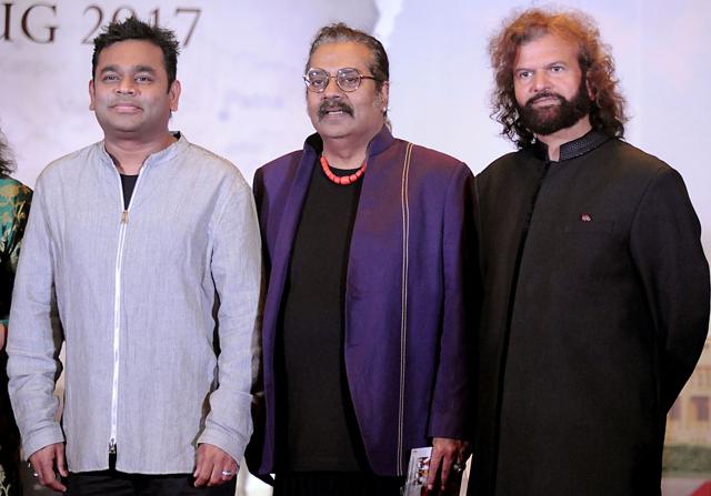 Bollywood singers Hariharan (L) and Hansraj Hans (R) and film score composer and singer AR Rahman pose for a photograph during a promotional event for Partition 1947 in Mumbai on July 4. (AFP)