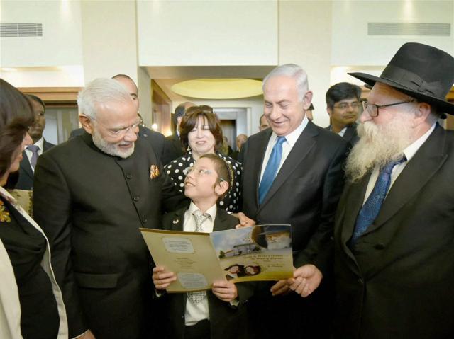 Prime Minister Narendra Modi meets with the 11-year-old Moshe Holtzberg. (PTI Photo)