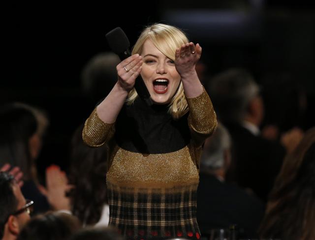 Emma Stone speaks amid show attendees at 2017 American Film Institute Life Achievement Award. (REUTERS) Emma Stone speaks amid show attendees at 2017 American Film Institute Life Achievement Award. (REUTERS)