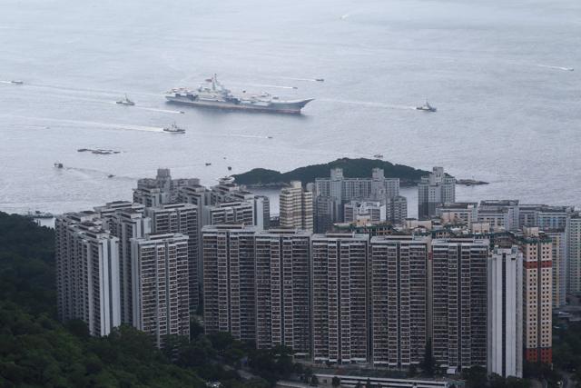 Aircraft carrier Liaoning sails into Hong Kong. (Reuters) Aircraft carrier Liaoning sails into Hong Kong. (Reuters)