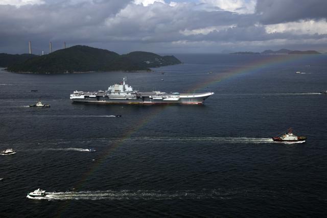 The Liaoning, the China's first domestically built aircraft carrier, sails into Hong Kong for port call on July 7, 2017 to celebrate the 20th anniversary of the People's Liberation Army (PLA) garrison's presence in the semi-autonomous Chinese city and former British colony. (AP) The Liaoning, the China's first domestically built aircraft carrier, sails into Hong Kong for port call on July 7, 2017 to celebrate the 20th anniversary of the People's Liberation Army (PLA) garrison's presence in the semi-autonomous Chinese city and former British colony. (AP)