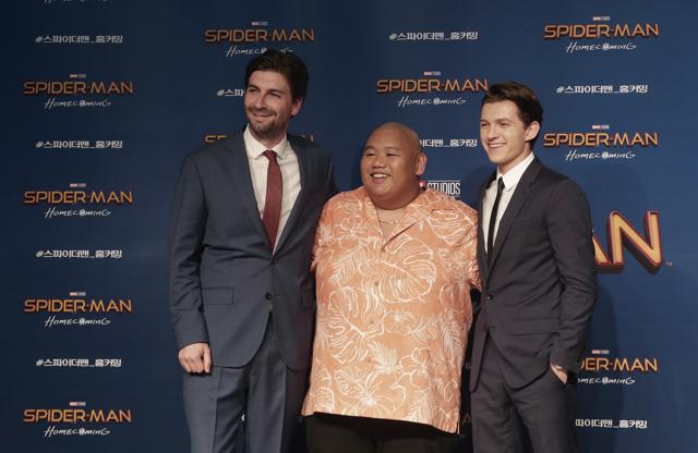 Director Jon Watts, left, and actors Jacob Batalon, centre, and Tom Holland, pose during a promotional event for their latest film Spider-Man: Homecoming in Seoul, South Korea. (AP)