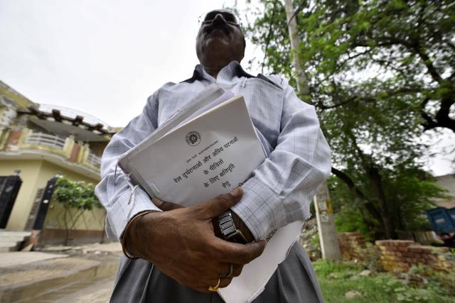 Amod Verma, who works at Haryana Railway's claims department, at Junaid’s village to settle compensation claim. (Arun Sharma/HT photo) Amod Verma, who works at Haryana Railway's claims department, at Junaid’s village to settle compensation claim. (Arun Sharma/HT photo)