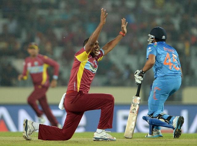 Samuel Badree (C) has dismissed Rohit Sharma (R) in the past. (AFP/Getty Images) Samuel Badree (C) has dismissed Rohit Sharma (R) in the past. (AFP/Getty Images)