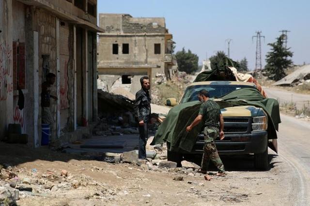 Free Syrian Army fighters in Quneitra, Syria on July 8, 2017. (Reuters) Free Syrian Army fighters in Quneitra, Syria on July 8, 2017. (Reuters)