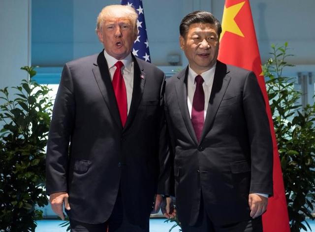US President Donald Trump and Chinese President Xi Jinping meet on the sidelines of the G20 Summit in Hamburg on July 8, 2017. (Reuters) US President Donald Trump and Chinese President Xi Jinping meet on the sidelines of the G20 Summit in Hamburg on July 8, 2017. (Reuters)