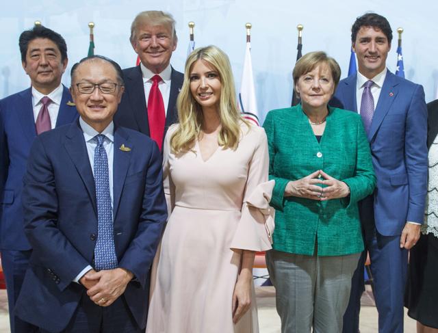 (Left to right) Japanese Prime Minister Shinzo Abe, World Bank President Jim Yong Kim, US President Donald Trump and his daughter Ivanka Trump, German Chancellor Angela Merkel and Canadian Prime Minister Justin Trudeau at the G20 summit on July 8, 2017 in Hamburg. (AP) (Left to right) Japanese Prime Minister Shinzo Abe, World Bank President Jim Yong Kim, US President Donald Trump and his daughter Ivanka Trump, German Chancellor Angela Merkel and Canadian Prime Minister Justin Trudeau at the G20 summit on July 8, 2017 in Hamburg. (AP)