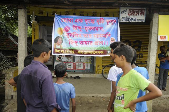 A banner preaching peace and communal harmony in Basirhat. Such banners are visible in various neighbourhoods of the subdivision. (Samir Jana)