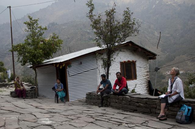 Elizabeth Brenner (R), gazes skywards during her meeting with locals in Lilam village in the mountainous state of Uttarakhand in north India. She is on a journey through India tracing the last footsteps of her son and talking to locals who were involved in the rescue efforts more than five-years-ago. (Rishabh R. Jain / AP) Elizabeth Brenner (R), gazes skywards during her meeting with locals in Lilam village in the mountainous state of Uttarakhand in north India. She is on a journey through India tracing the last footsteps of her son and talking to locals who were involved in the rescue efforts more than five-years-ago. (Rishabh R. Jain / AP)