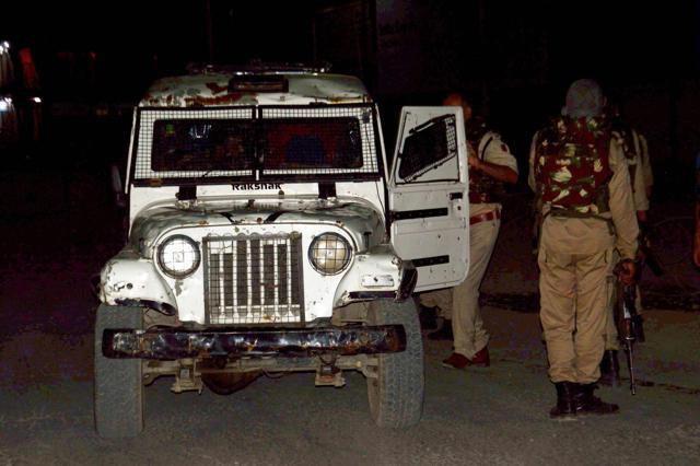 Security person stand guard after militants opened fire on the Amarnath pilgrims. (PTI Photo) Security person stand guard after militants opened fire on the Amarnath pilgrims. (PTI Photo)