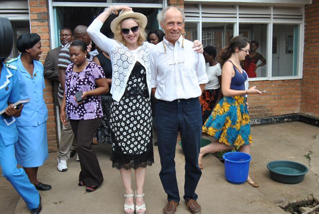 This file photo taken on November 27, 2014 shows US pop star Madonna (L) walking out with Dr. Eric Borgstein (R) after visiting the Queen Elizabeth Central Hospital (QECH) where he launched a new project with Ministry of Health to construct a pediatric surgery and intensive care unit at the hospital in Blantyre, Malawi. (AFP) This file photo taken on November 27, 2014 shows US pop star Madonna (L) walking out with Dr. Eric Borgstein (R) after visiting the Queen Elizabeth Central Hospital (QECH) where he launched a new project with Ministry of Health to construct a pediatric surgery and intensive care unit at the hospital in Blantyre, Malawi. (AFP)