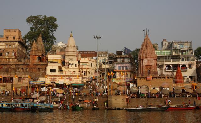 Temples and residential buildings are seen on the banks of the river Ganga in Varanasi. A number of schemes were announced for Hindu pilgrimage towns of Ayodhya, Varanasi, Mathura and Chitrakoot. (REUTERS) Temples and residential buildings are seen on the banks of the river Ganga in Varanasi. A number of schemes were announced for Hindu pilgrimage towns of Ayodhya, Varanasi, Mathura and Chitrakoot. (REUTERS)
