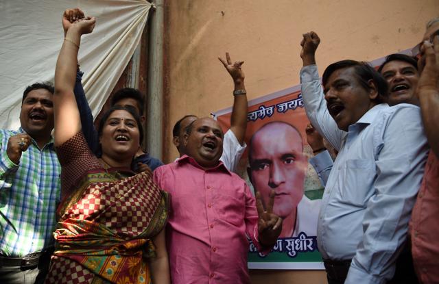 Friends of Kulbhushan Jadhav react after he was given a stay of execution in the neighbourhood where he grew up in Mumbai on May 18, 2017. (AFP) Friends of Kulbhushan Jadhav react after he was given a stay of execution in the neighbourhood where he grew up in Mumbai on May 18, 2017. (AFP)
