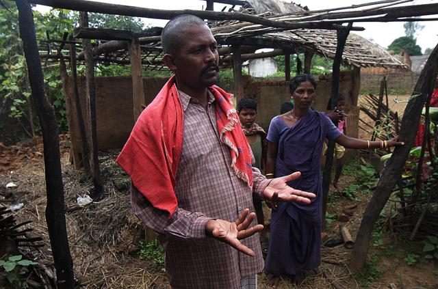 Hari Chand Digal and his family in front of their burnt home in Minia village in Kandhamal District on October 9, 2008. (Vipin Kumar/HT) Hari Chand Digal and his family in front of their burnt home in Minia village in Kandhamal District on October 9, 2008. (Vipin Kumar/HT)