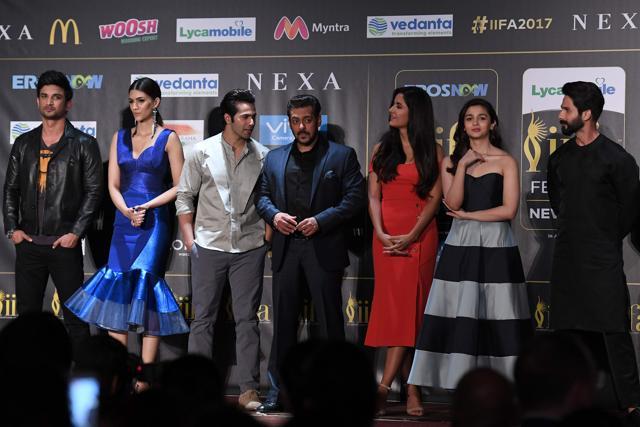 Sushant Singh Rajput, Kriti Sanon, Varun Dhawan, Salman Khan, Katrina Kaif, Alia Bhatt and Shahid Kapoor pose during a press conference ahead of the 18th International Indian Film Academy. (AFP)