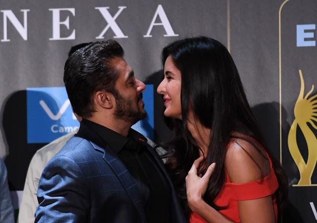 Salman Khan greets actress Katrina Kaif during a press conference. (AFP)