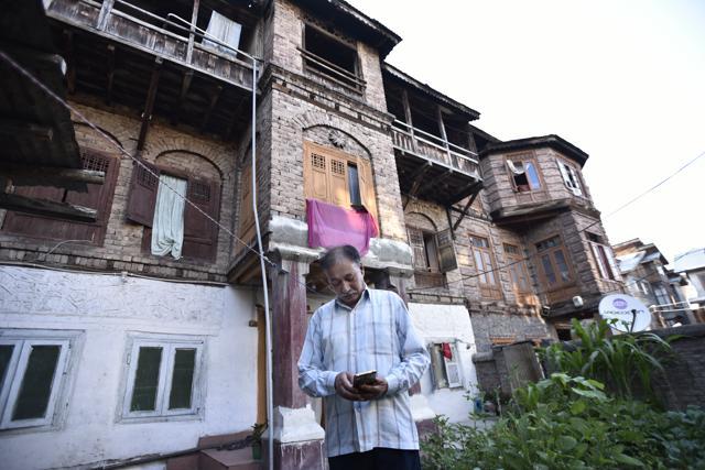 Sanjay Tickoo, president of the Kashmiri Pandit Sangharsh Samiti at his home in Srinagar. (Burhaan Kinu / HT Photo) Sanjay Tickoo, president of the Kashmiri Pandit Sangharsh Samiti at his home in Srinagar. (Burhaan Kinu / HT Photo)