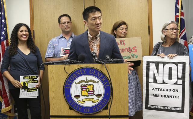 Hawaii Attorney General Douglas Chin speaks at a news conference about President Donald Donald Trump's travel ban in Honolulu on June 30, 2017. (AP File Photo) Hawaii Attorney General Douglas Chin speaks at a news conference about President Donald Donald Trump's travel ban in Honolulu on June 30, 2017. (AP File Photo)