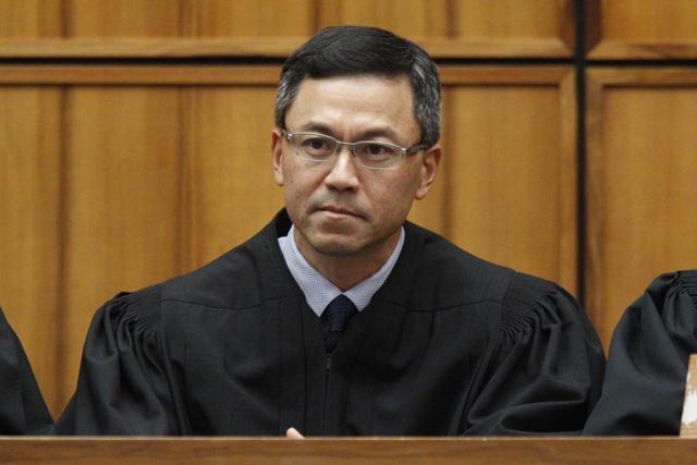 US District Judge Derrick Watson in Honolulu in December 2015 . (AP File Photo) US District Judge Derrick Watson in Honolulu in December 2015 . (AP File Photo)