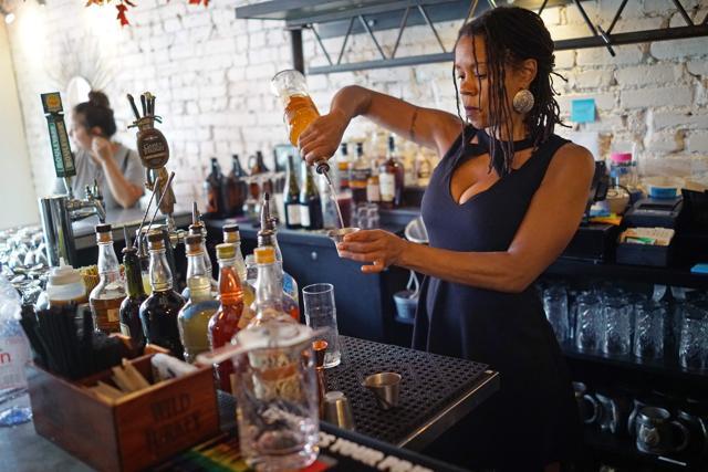 A bartender makes a drink at the bar. (Mandel Ngan/AFP) A bartender makes a drink at the bar. (Mandel Ngan/AFP)