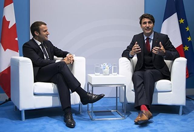 Canadian PM Justin Trudeau’s colourful red patterned statement socks stole the show at the G20 summit on July 7. (Bertrand Guay/AFP) Canadian PM Justin Trudeau’s colourful red patterned statement socks stole the show at the G20 summit on July 7. (Bertrand Guay/AFP)
