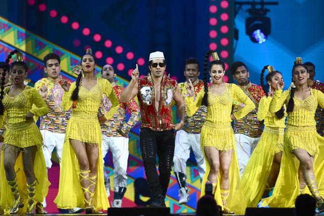 Varun Dhawan performs on stage during the 18th International Indian Film Academy (IIFA) Festival. (AFP)