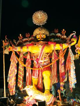 A traditional naga image displayed during Gosani Yatra. They represent the valiant young men who took the challenge of protecting the deity and the temple from foreign attacks. Notice the chiselled, muscular build, the result of body building through rigorous exercise nad practice in the jaga akhadas of Puri. (Text and photographs copyright Subas Pani) A traditional naga image displayed during Gosani Yatra. They represent the valiant young men who took the challenge of protecting the deity and the temple from foreign attacks. Notice the chiselled, muscular build, the result of body building through rigorous exercise nad practice in the jaga akhadas of Puri. (Text and photographs copyright Subas Pani)
