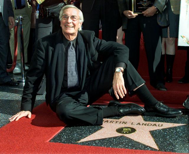 Academy award winning actor Martin Landau sits on his new star on the Hollywood Walk of Fame, as he poses for photographers during ceremonies to honour him, in Hollywood, December 17, 2001. (REUTERS) Academy award winning actor Martin Landau sits on his new star on the Hollywood Walk of Fame, as he poses for photographers during ceremonies to honour him, in Hollywood, December 17, 2001. (REUTERS)