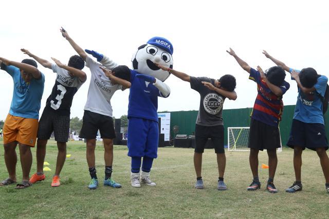 Players do the dab with GIFA mascot at last year’s SARE Homes HT GIFA.