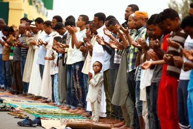 Muslims take part in Friday prayers within the walled city of Harar, Ethiopia. (Tiksa Negeri / REUTERS) Muslims take part in Friday prayers within the walled city of Harar, Ethiopia. (Tiksa Negeri / REUTERS)