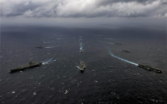 Ships during the sea phase of tri-Nation Malabar 2017 Exercise comprising India, Japan and US navies, in Bay of Bengal near Chennai coast on Monday. (PTI) Ships during the sea phase of tri-Nation Malabar 2017 Exercise comprising India, Japan and US navies, in Bay of Bengal near Chennai coast on Monday. (PTI)