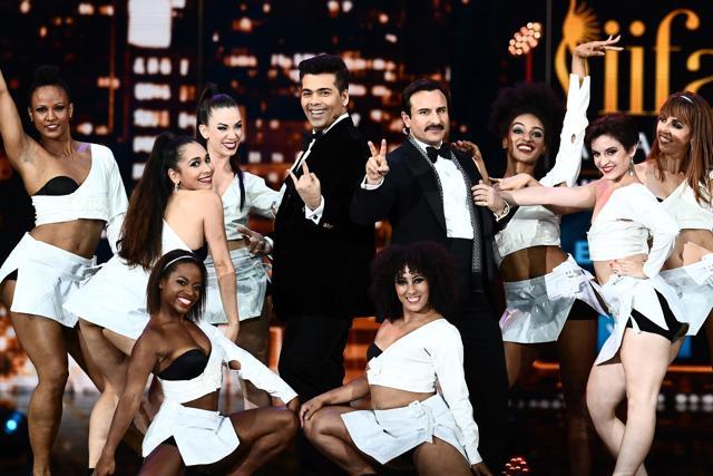 Bollywood actor Saif Ali Khan (R) and director/producer Karan Johar perform on stage during the IIFA Awards of the 18th International Indian Film Academy. (AFP) Bollywood actor Saif Ali Khan (R) and director/producer Karan Johar perform on stage during the IIFA Awards of the 18th International Indian Film Academy. (AFP)