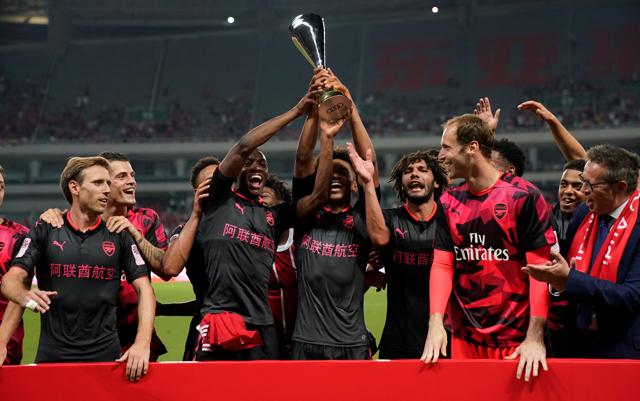 Arsenal celebrate with the International Champions Cup trophy. (REUTERS) Arsenal celebrate with the International Champions Cup trophy. (REUTERS)