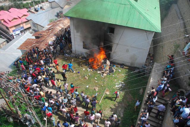 A police station in Kotkhai near Shimla was set on fire on Wednesday by protesters. (PTI) A police station in Kotkhai near Shimla was set on fire on Wednesday by protesters. (PTI)