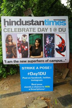 Freshers take pictures with the cut out of Hindustan Times.  (Amal KS/ Hindustan Times photo )
