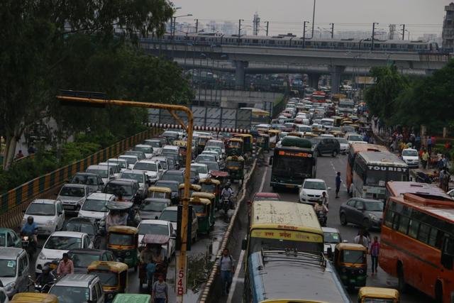 Due to waterlogging in Noida, most of the roads witnessed traffic jams. (Salman Ali/HT Photo)