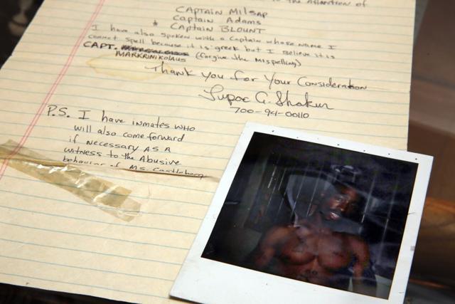 A Tupac Shakur two-page handwritten and signed prison letter to the deputy warden of Riker's Island Prison, and a prison Polaroid of Shakur, estimated at $60,000 to $80,000, are displayed at Gotta Have It! Collectibles, in New York, Wednesday, July 19, 2017. (AP) A Tupac Shakur two-page handwritten and signed prison letter to the deputy warden of Riker's Island Prison, and a prison Polaroid of Shakur, estimated at $60,000 to $80,000, are displayed at Gotta Have It! Collectibles, in New York, Wednesday, July 19, 2017. (AP)