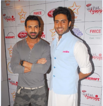 Actors John Abraham and Abhishek Bachchan at an event.