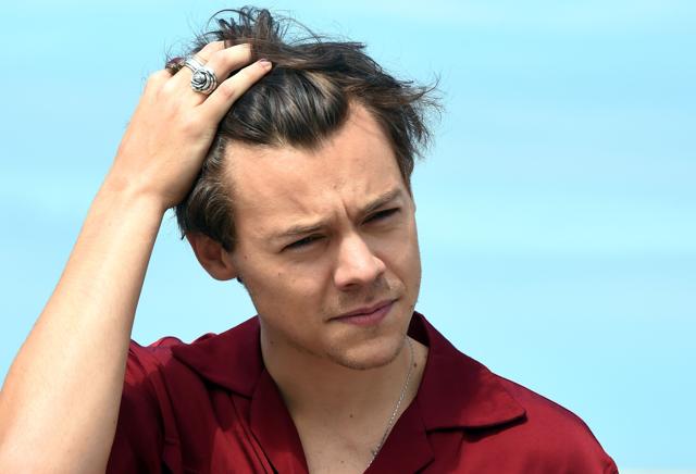 English singer, songwriter and actor Harry Styles poses on July 16, 2017, during a photo-call in Dunkirk. (AFP)