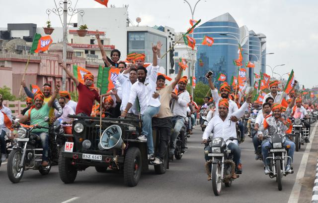 Supporters escort Amit Shah from Sanganer airport to the party office on the first day of his three-day visit to Rajasthan. (Prabhakar Sharma/ HT Photo) Supporters escort Amit Shah from Sanganer airport to the party office on the first day of his three-day visit to Rajasthan. (Prabhakar Sharma/ HT Photo)