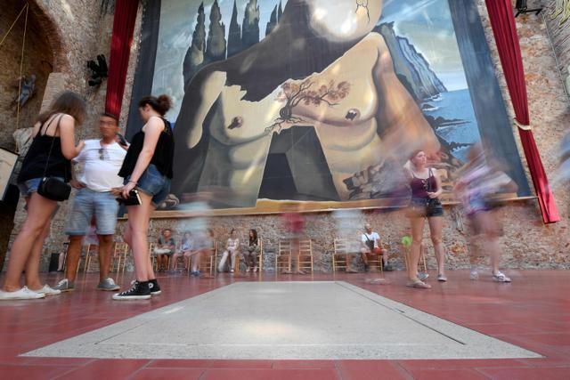 Visitors walk around Salvador Dali's tomb inside the Teatre-Museu Dali. (AFP) Visitors walk around Salvador Dali's tomb inside the Teatre-Museu Dali. (AFP)